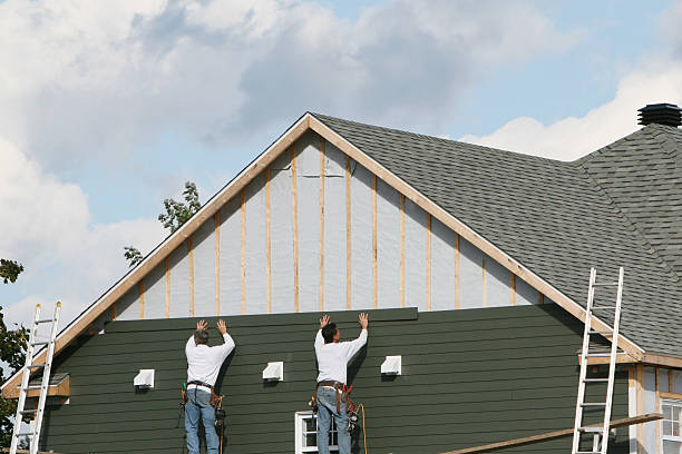 Professional Siding Replacement technician working in Hampton, GA